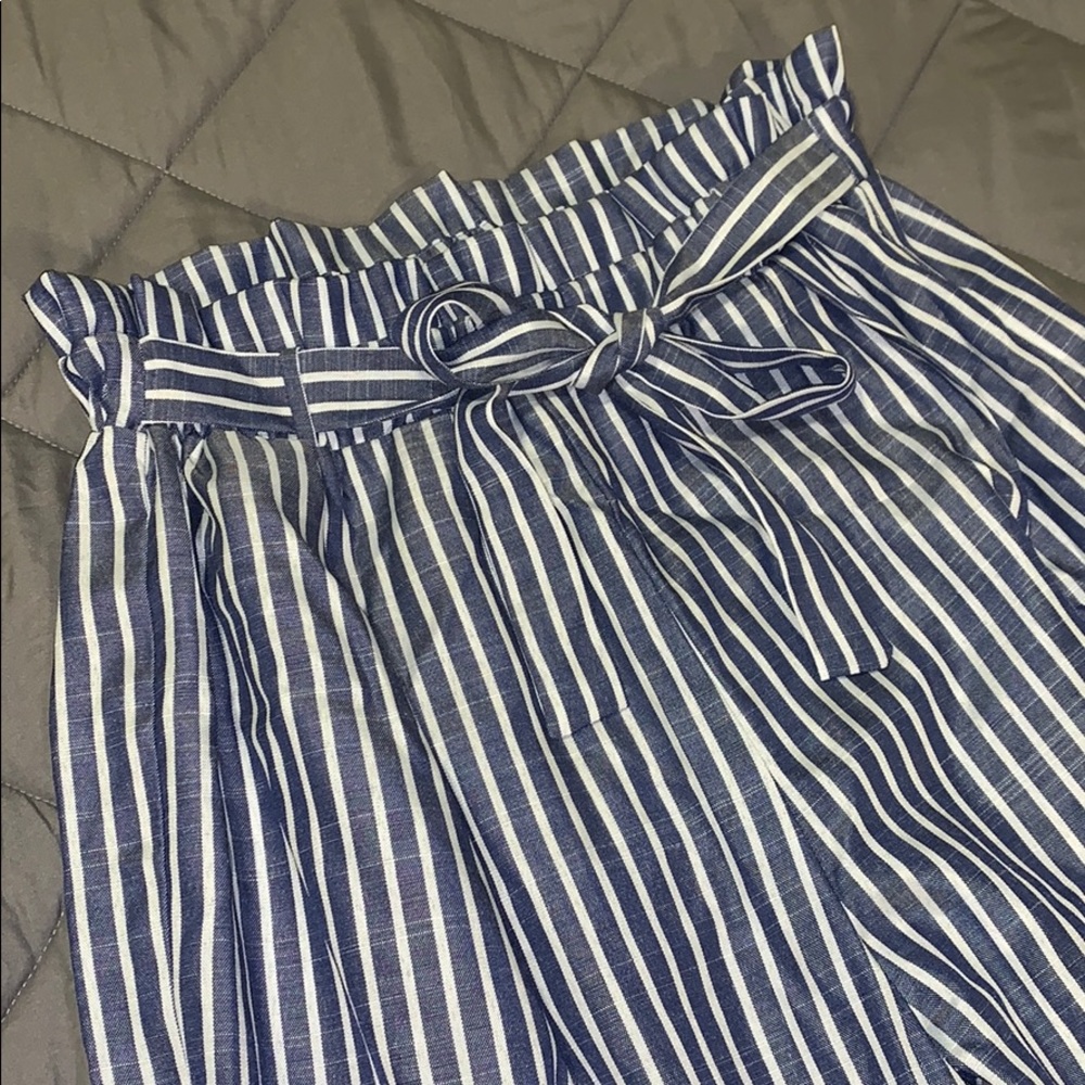 Blue and white striped paper bag pants
